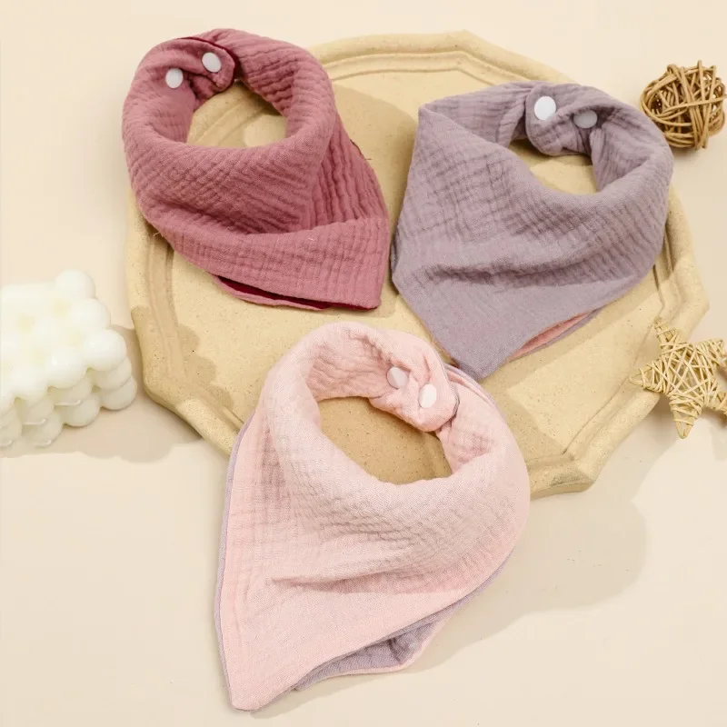 

Selling four layers of pure cotton gauze saliva towel baby triangle towel color baby bib bib to prevent dirty