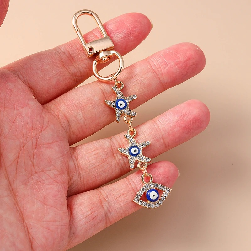 Nette Kristall Evil Eye Hand Seestern Schlüsselbund für Auto Schlüssel Frauen Mädchen Handtasche Anhänger Schlüsselanhänger Zubehör DIY Schmuck Decora – Detail 4