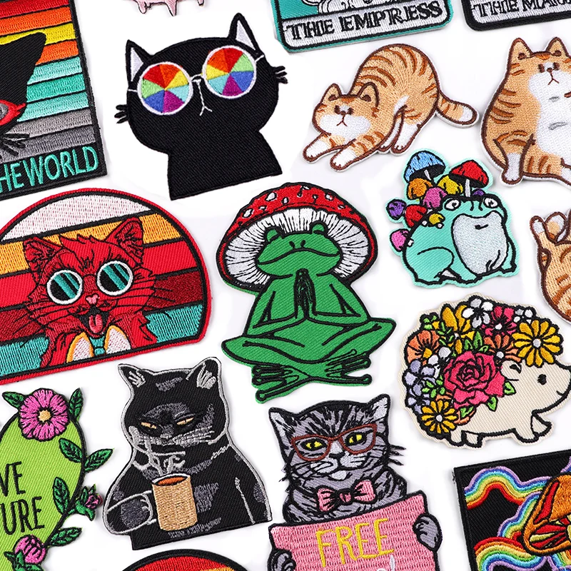 Collection of colorful patches featuring various designs on a white background