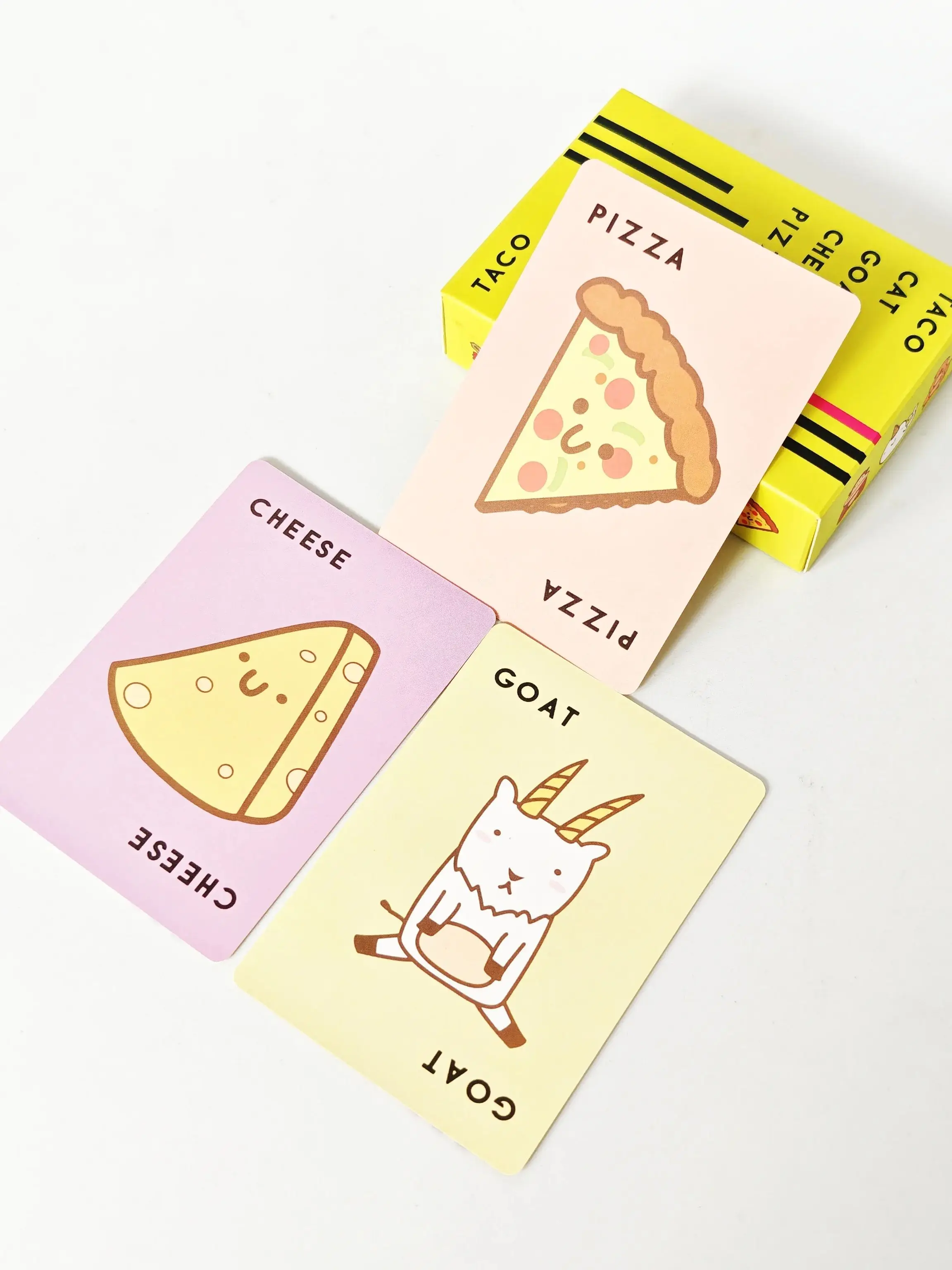 פיצה גבינה של עזים וחתול טאקו |   משחק קלפים |   3-8 שחקנים |   זמן משחק 10-30 דקות |   משחק קלפים מהנה, משחקי לוח למסיבה