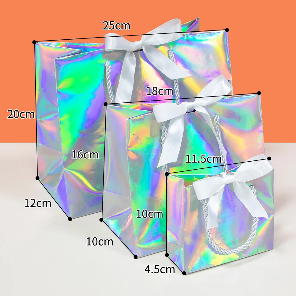Laser gift paper bag holiday party gold and silver packaging carton ribbon small paper bag