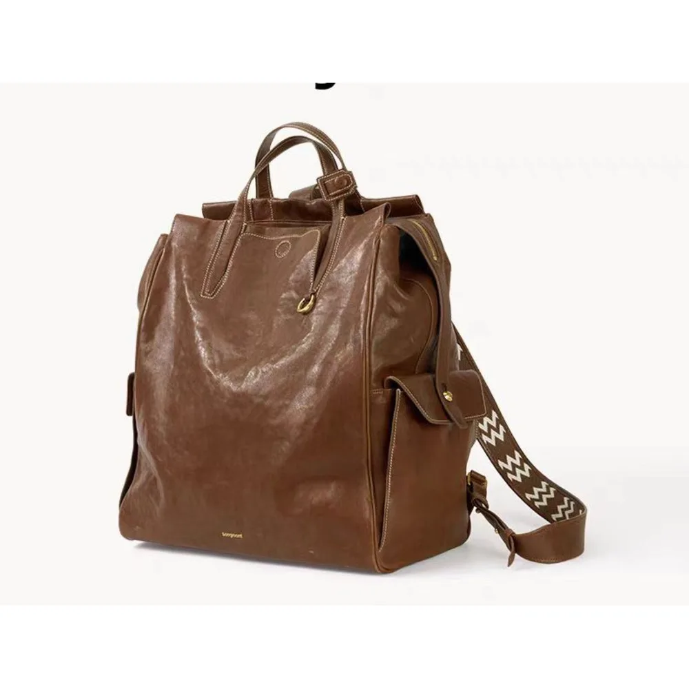 At the foot of Mountain, there is a backpack called series large unisex vegetable tanned leather_voghion.com