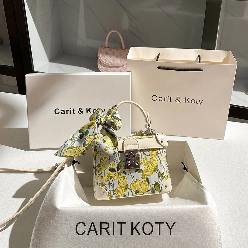 حقيبة مربعة فاخرة، مصممة بطبعة أزهار رائعة وملونة،...