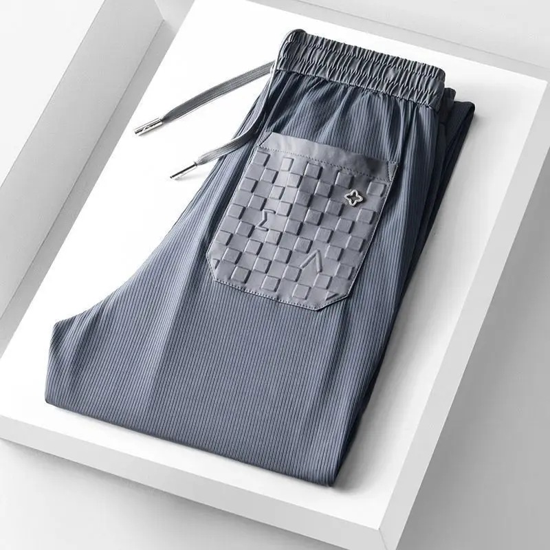 

High Quality Modal Men's Casual Pants 2023 New Light Luxury Wrinkle Resisting Fashion Stripe Checkered Sports Pants