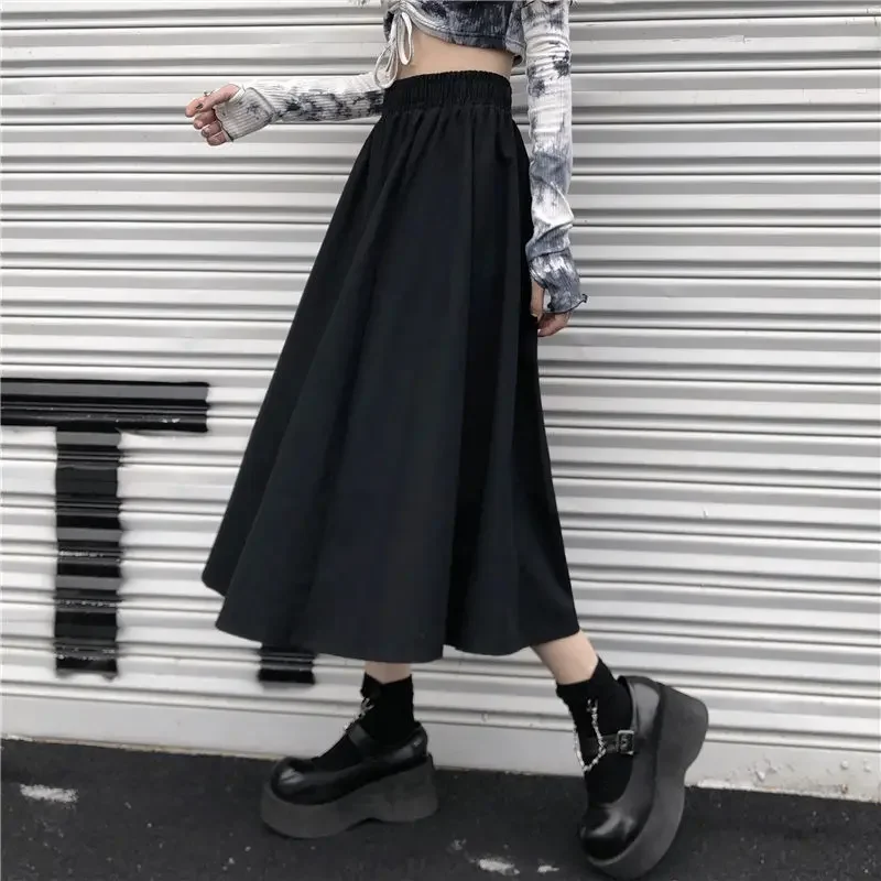 thumbnail image 1 of Falda negra para mujer Otoño/Invierno 2024 Nueva minifalda adelgazante de cintura alta y largo medio estilo japonés, 1 of 5