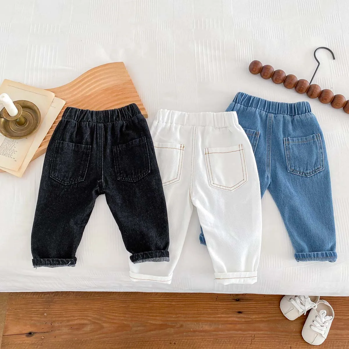 Description Picture 4 of item2025 Spring New Baby Soft Denim Pants Solid Girls Jeans Simple Children Casual Pants Toddler Boy Loose Trousers Infant Clothes