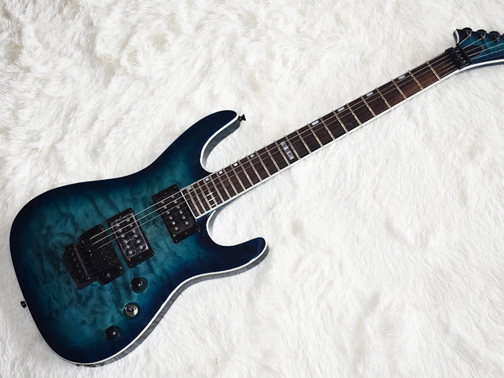 

Blue body floyd electric guitar 6 strings with humbuckers 24 frets rosewood fretboard can be customized