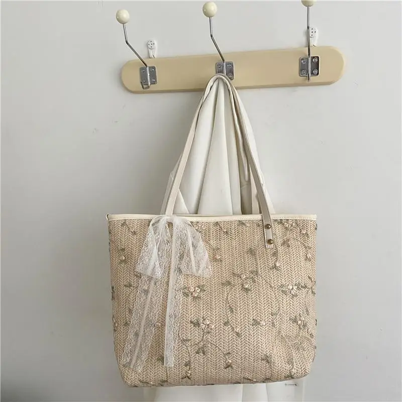 Borsa tote in paglia intrecciata con ricamo floreale e dettaglio fiocco in pizzo, perfetta per il pendolarismo quotidiano, gite in spiaggia e shopping - immagine 2