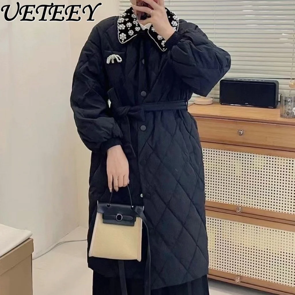 Рисунок 3 - Женский пуховик средней длины