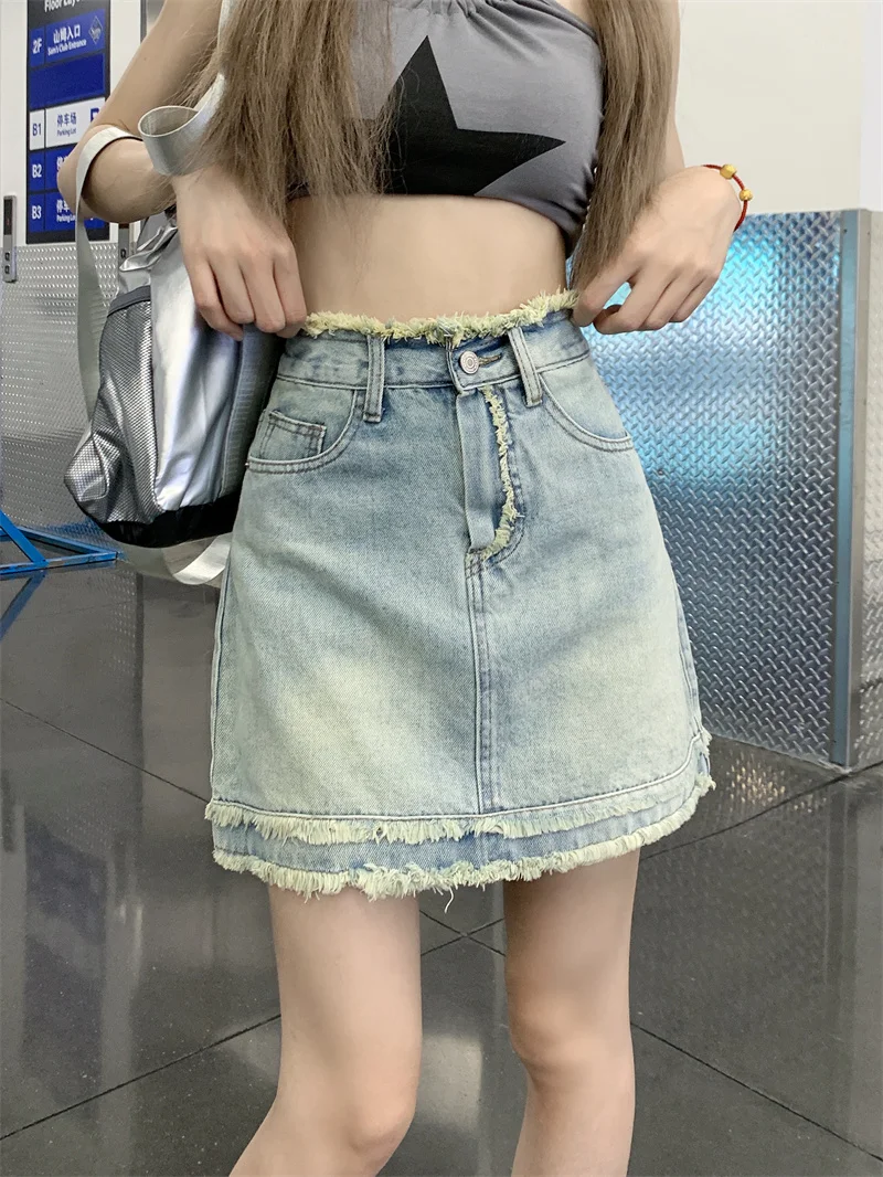 2023 New Vintage Denim Half Skirt Women's Spring Design High Waist Slim Tassel A-line Wrapped Hip Short Skirt