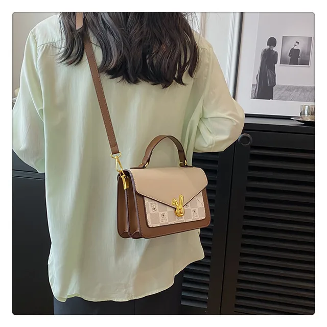 Olivia Mark - Sakura pink baguette armpit bag new senior sense of light  luxury bags female summer shoulder crossbody bag