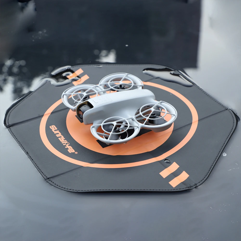 Tapis d'atterrissage pliable pour drone DJI NEO/Mini4Pro vu de dessus, montrant sa surface de 55cm et son design.