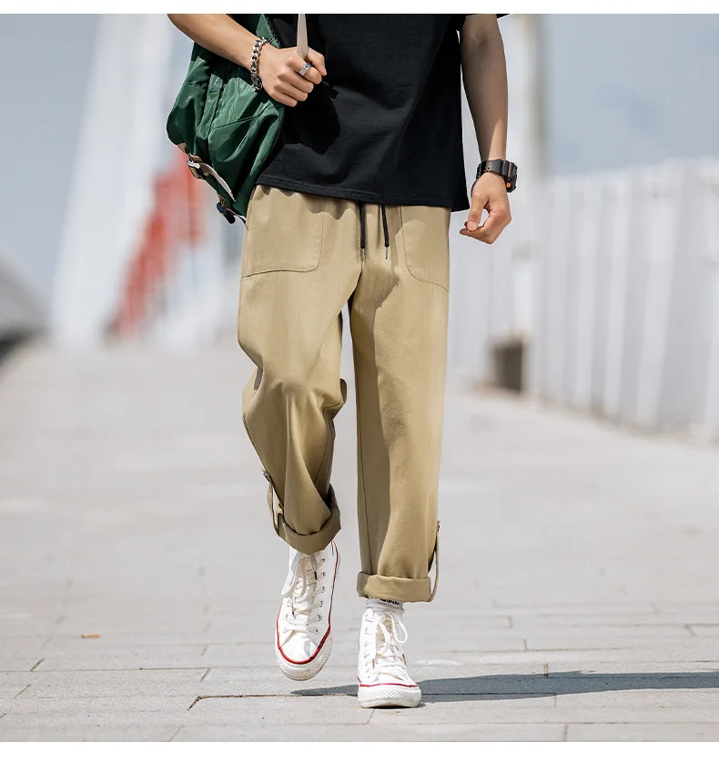 Casual pants with double feet in autumn and winter have a sense of design, tooling, straight long pants joggers men