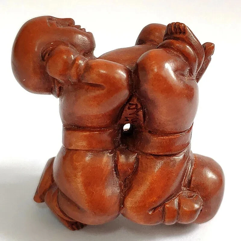 

Коллекционный 10-летний 2-дюймовый резной ящик Netsuke: для мальчиков, играющих в акробатику