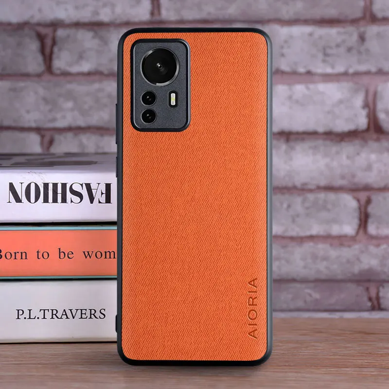 Luxury Textile Leather Case with Ultra-Soft TPU and Hard PC: Premium Camera Protection Design