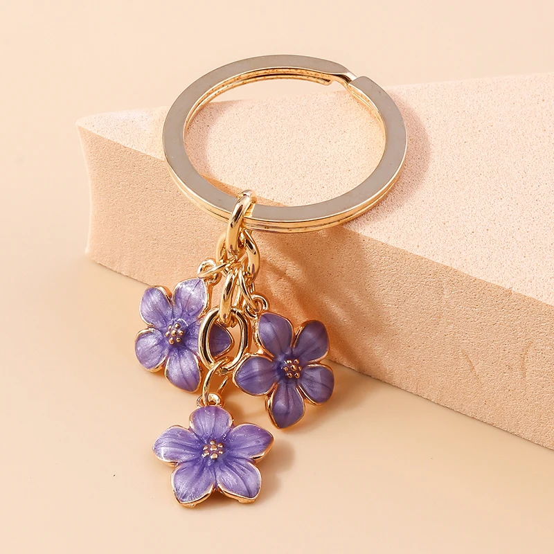 Nette Emaille Keychain Bunte Sakura Blume Schlüssel Ring Süße Schlüssel Ketten für Frauen Mädchen Handtasche Zubehör DIY Schmuck Geschenke