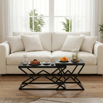A black, modern geometric coffee table with a solid wood top and a sturdy metal frame. An industrial-style living room cocktail