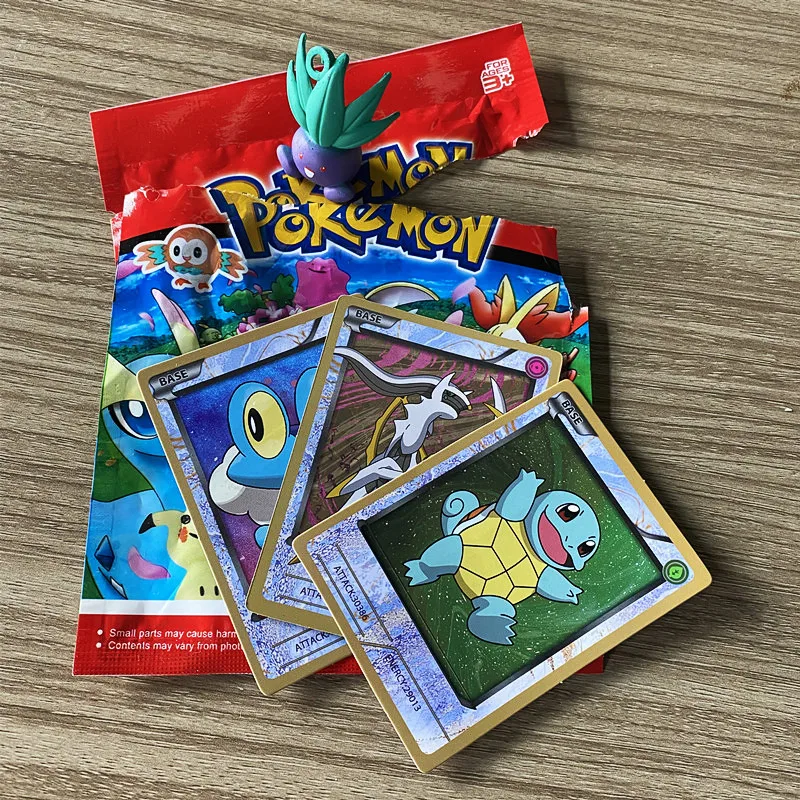 Novo pokemon bolsa cega 1 pçs boneca + 3 jogo coleção cartão pikachu  charmander aleatório 1 pacote de interesse animetoys presente