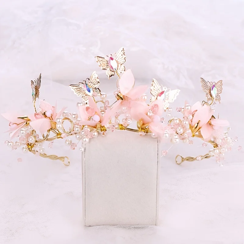 Elegant butterfly and pearl bridal wedding tiara.