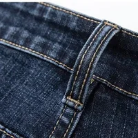 Jean droit extensible pour homme, style vintage, polyvalent, résistant à l'usure, en denim délavé, idéal pour le printemps et l'automne 6