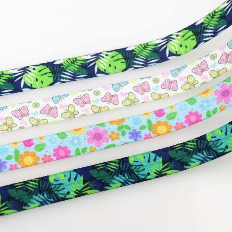 

DUWES 5/8'' 50yards Leaf Flowers Butterfly Printed Fold Elastic FOE Stretch Ribbon Hairbow Headwear Headband DIY OEM D1501