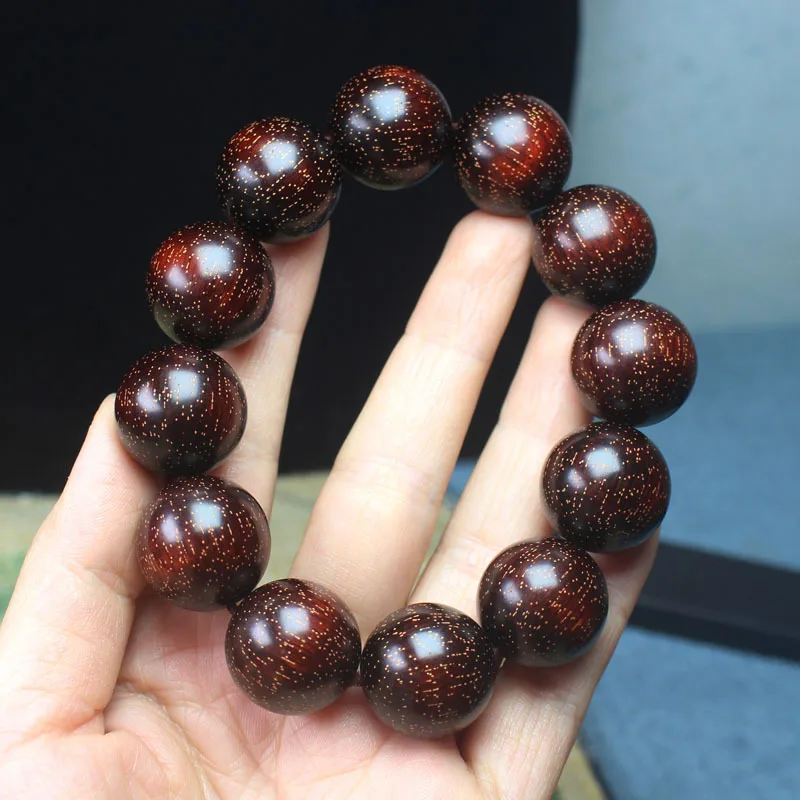 

Rhinoceros Horn Rosewood 20mm Golden Spots Beads Bracelet