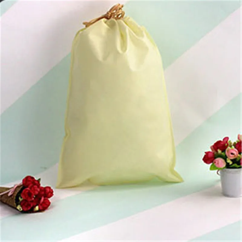 20 pieces  Non woven fabric drawstring bags for clothes/shoegift/Chrismas festival bags Dust bag Storage bag  accept custom logo 5