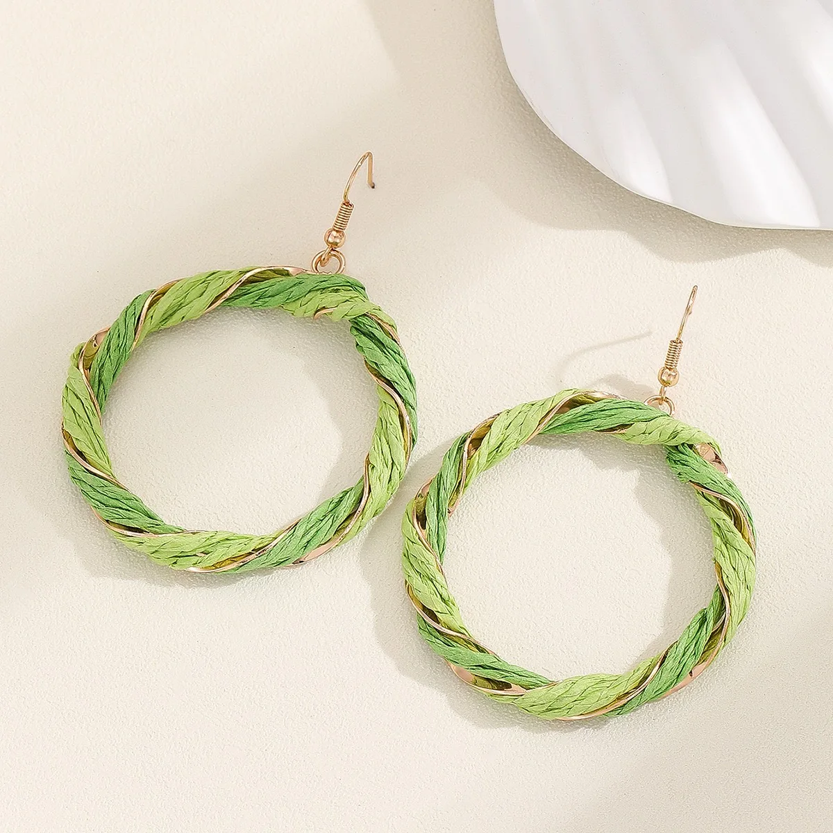 

Niche raffite woven round earrings