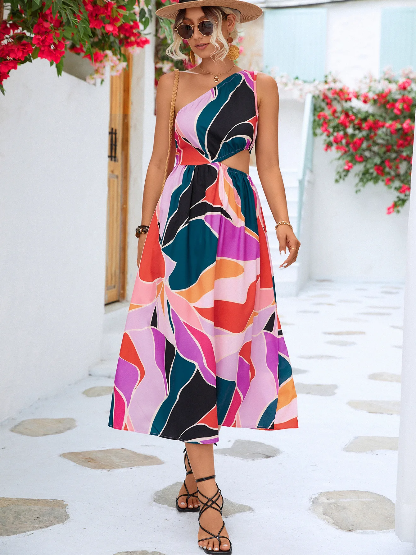 

One shoulder sleeveless dress with a hollowed out waist