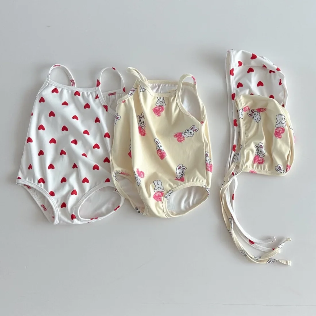 

New Summer Thin Baby Thin Love Print Swimwear Boy Girl Infant Suspenders Bodysuit+Cap 2pcs Children Cute Cartoon Rabbit Swimsuit