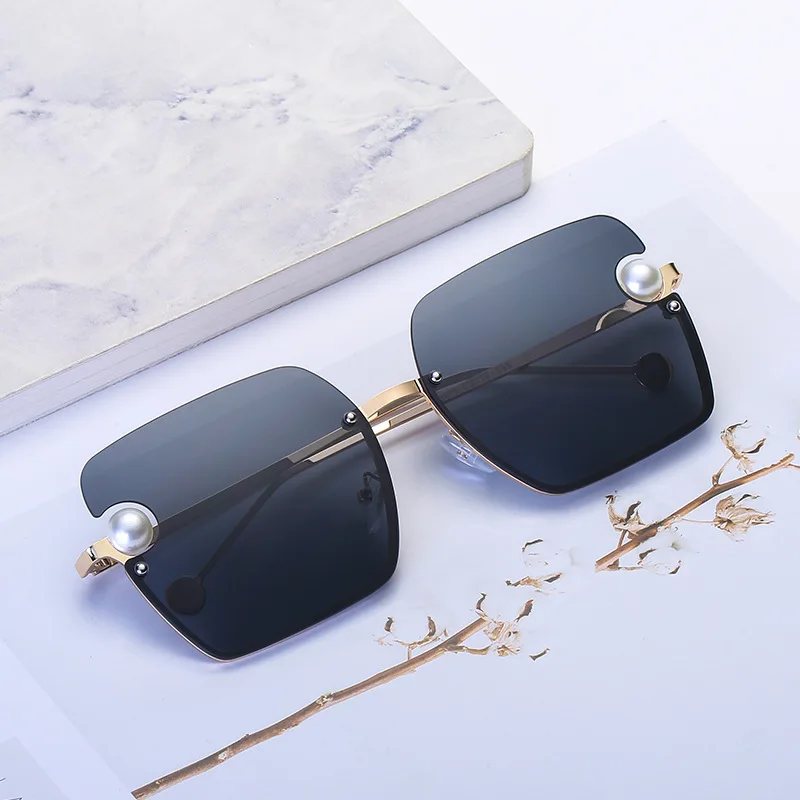 

New luxury frameless sunglasses retro metal large frame pearl decorative sunglasses ladies square gradient color sunglasses men