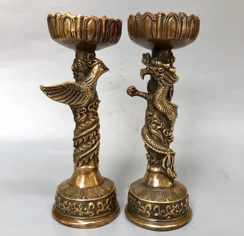 

Brass dragon and Phoenix Candlestick: a pair of dragon and Phoenix candlesticks; a pair of dragon and Phoenix candlesticks; hou
