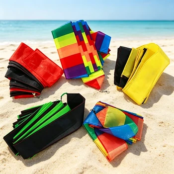 Grandi code di aquiloni, aquiloni a manica, aquiloni con coda arcobaleno, aquiloni a forma di uccello, avvolgicorda, drachen, cometas, accessori da spiaggia