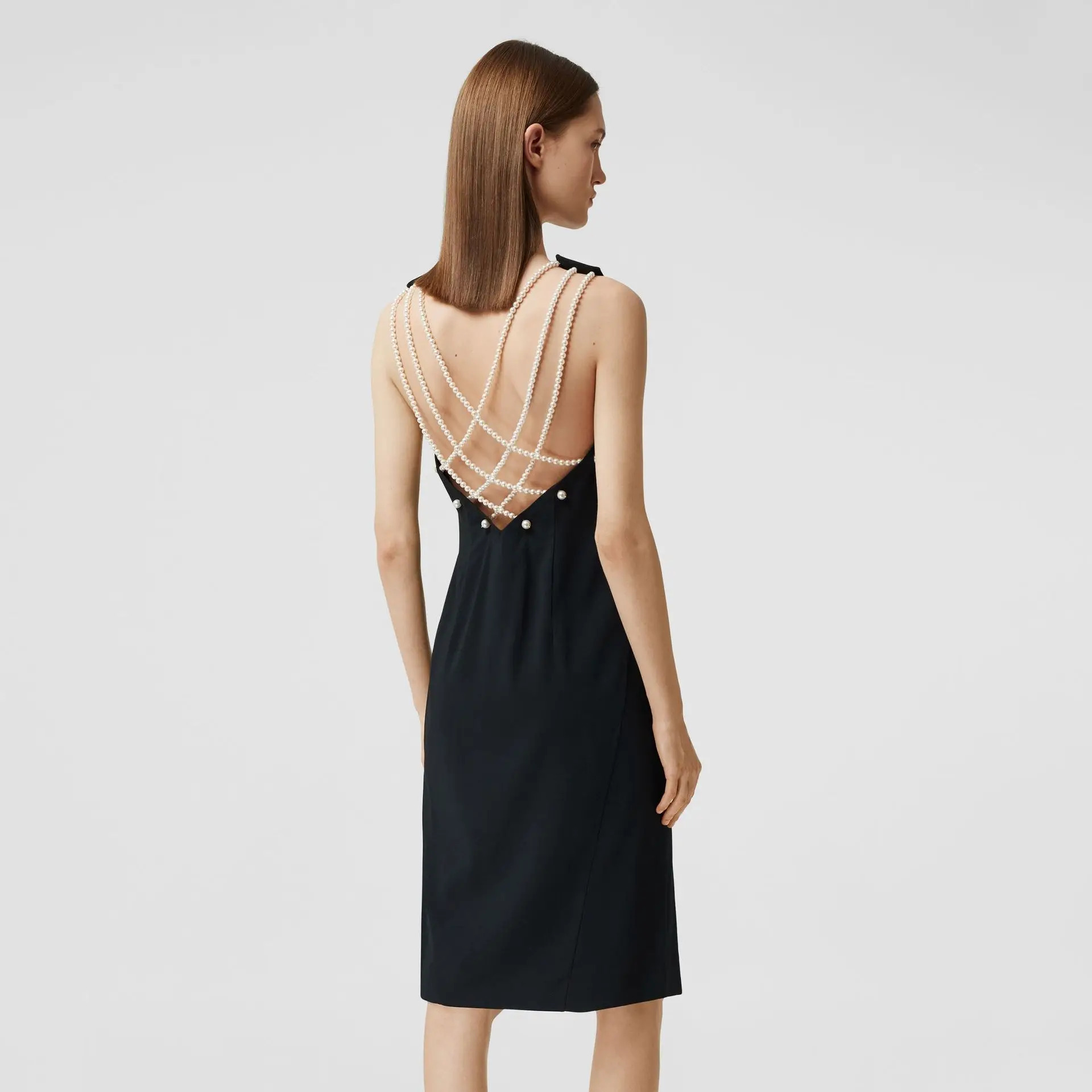 

2022 Summer Women's New Hepburn Fashion Sexy Pearl Knitting Niche Design Premium Dress Wear