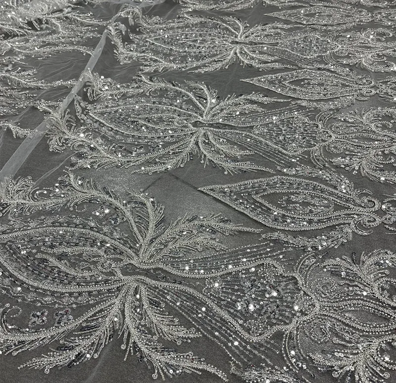

Gorgeous Unique Pattern Machine Beaded Lace Fabric For Bridal Wedding dress