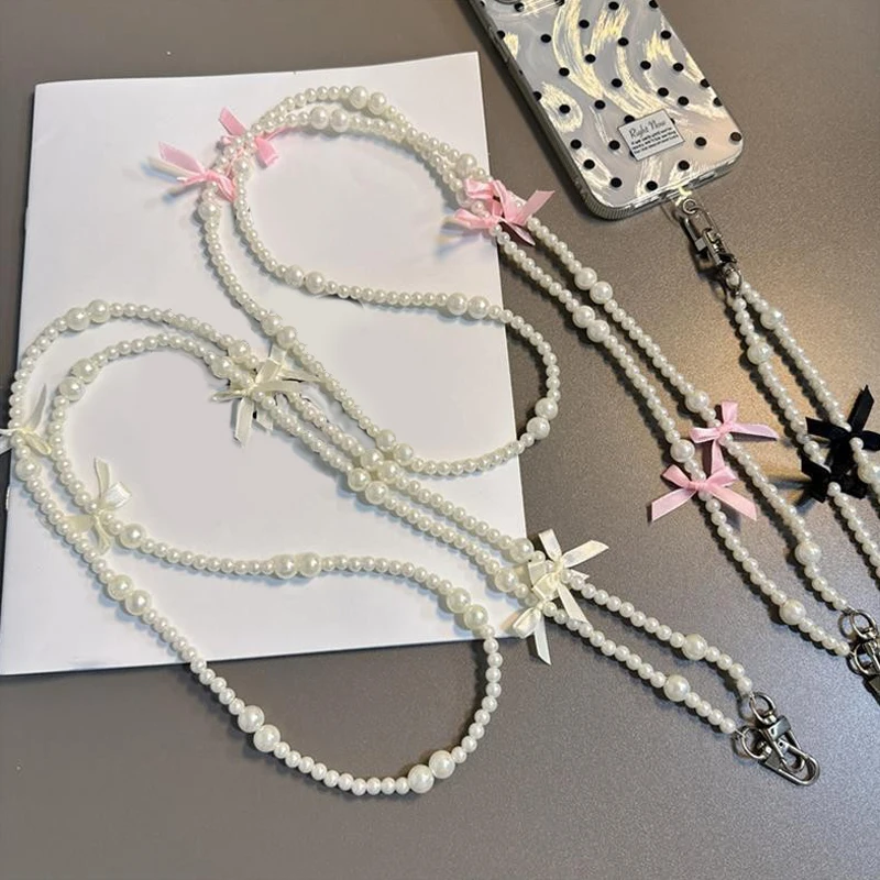 Elegant Pearl Bow Crossbody Phone Lanyard with Universal Anti-Lost Design