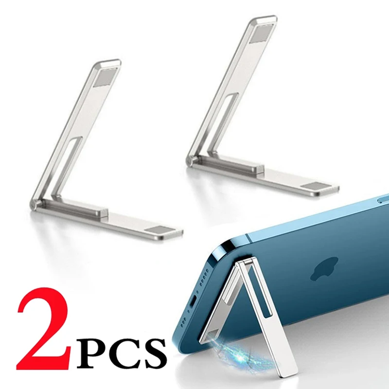 408871-6fa3c3.jpg Sa9c9b99e1dbc4497a60b4bfc3a2194deL Magnetic Ultra Thin Foldable Mobile Phone Holder Bracket Metal Alloy Desktop Cell Phone Stands Universal Phone Support Kickstand Mallzona