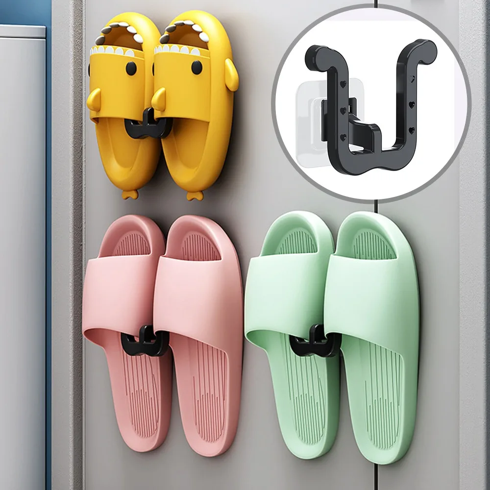 https://ae01.alicdn.com/kf/Sa9c9e4ccbddd4d638d6b8809e9b28708b/Slipper-Rack-Self-adhesive-No-Punching-Bathroom-Simple-Slipper-Hook-Toilet-Drainage-Rack-Wall-Mounted-Storage.jpg