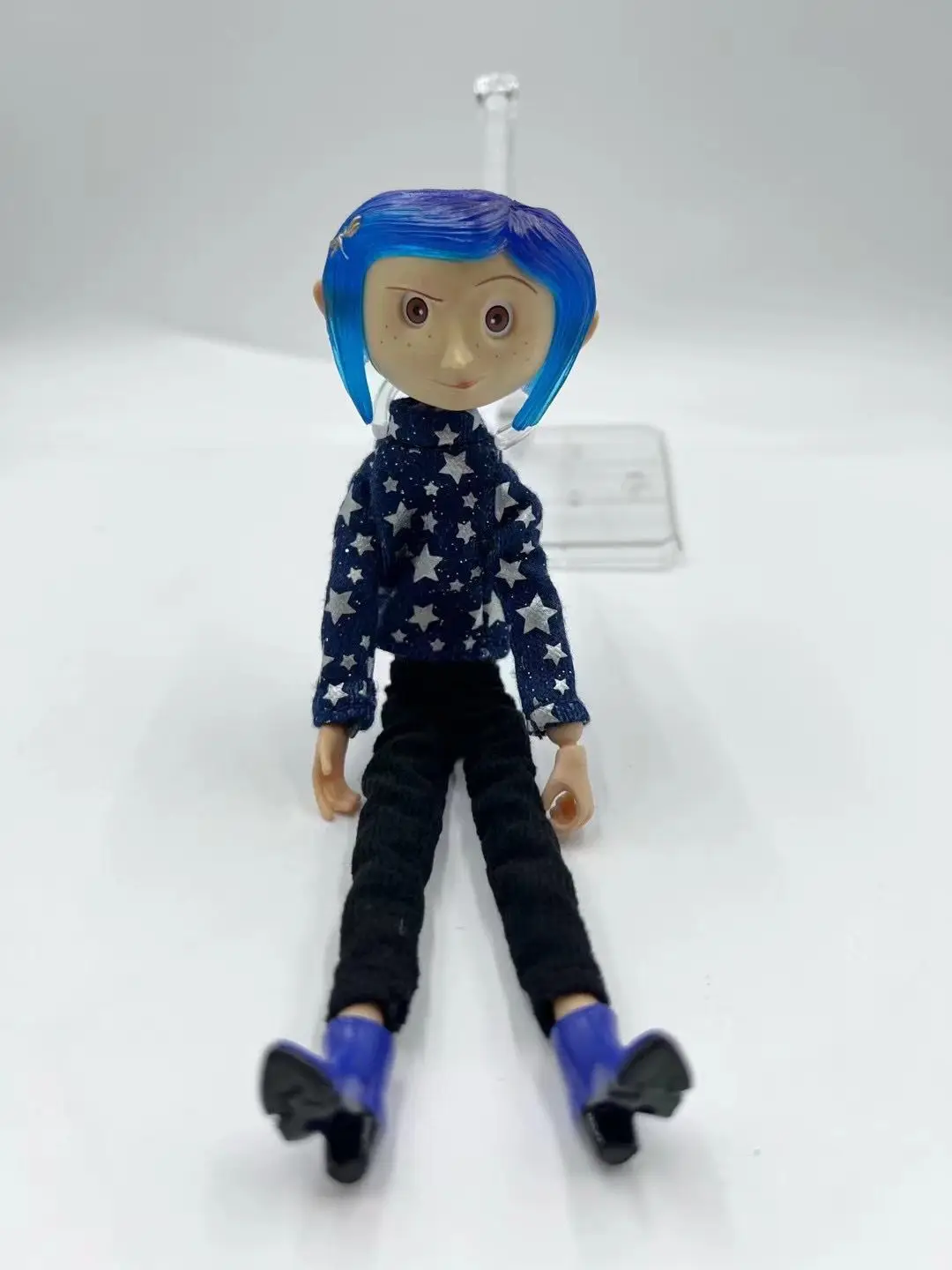 Puerta Secreta Sueter Estrellas NECA Coraline La Puerta Secreta