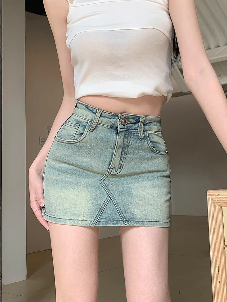 

Benuynffy Y2K Vintage Short Denim Mini Skirts Women Streetwear Bodycon Skirts High Waist Fashion A-line Washed Jeans Skrits