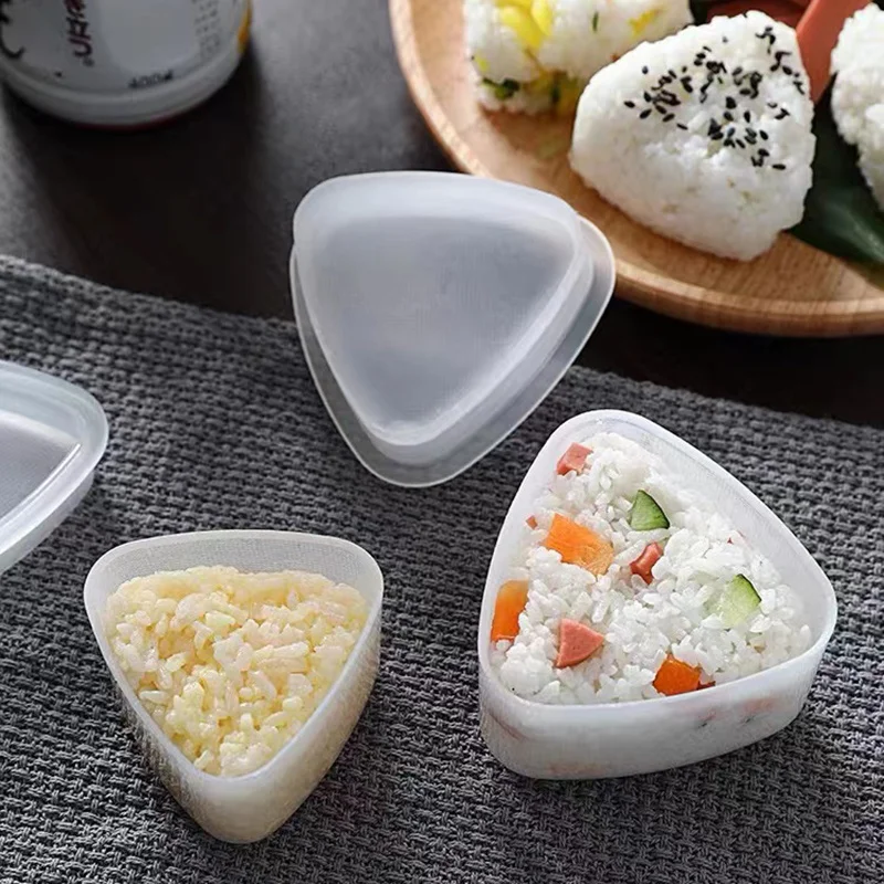 https://ae01.alicdn.com/kf/Sa9dabc26bc704566ade21e0469d2f11as/Cartoon-Sushi-Maker-Roller-Kitchen-Bento-Accessories-Rice-Ball-Maker-Mould-Onigiri-Rice-Mold-Sushi-Mold.jpg