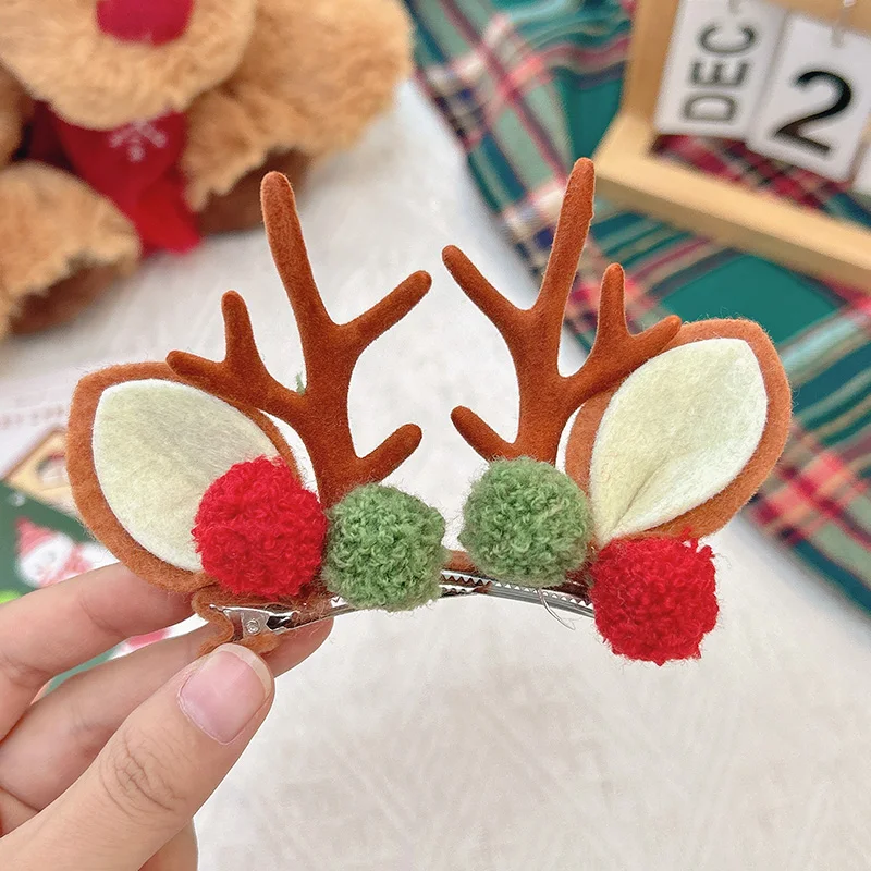 Red and green fur ball brown antlers