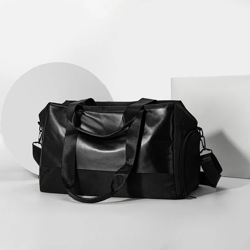 Adjustable, high-capacity travel bag suitable for weekend getaways | Black softshell with zipper closure