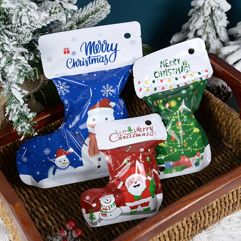 https://ae01.alicdn.com/kf/Saa06af0db76f451895ee4d328271dad6F/10pcs-Christmas-Socks-Boots-Shape-Gift-Bags-Santa-Claus-Snowman-Candy-Bag-Plastic-Ziplock-Package-Bags.jpg