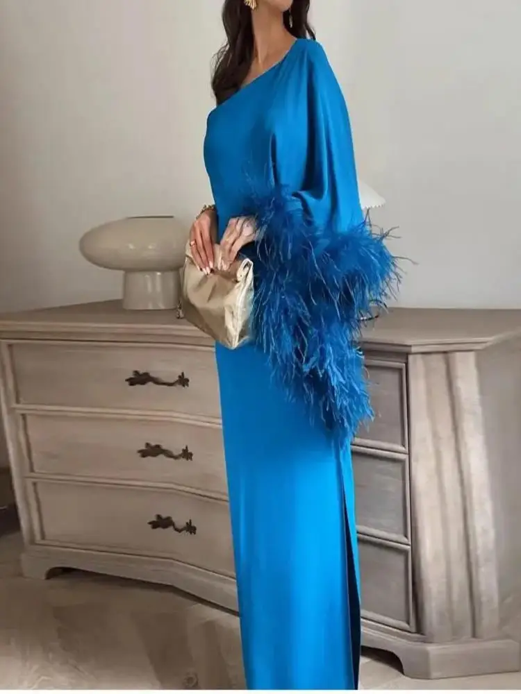 Рисунок 3 - Роскошные вечерние платья с перьями и открытой спиной