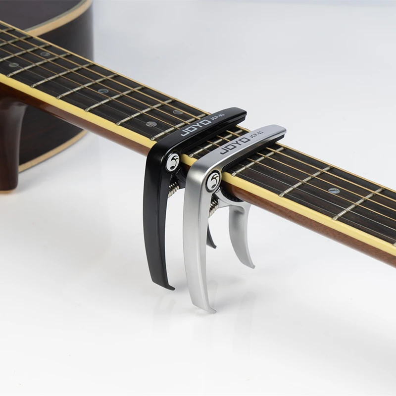 Negro Nuevo PVC Guitar Capo Clave de cambio rápido Clave acústica para guitarra clásica Capo para ajuste de tono 
