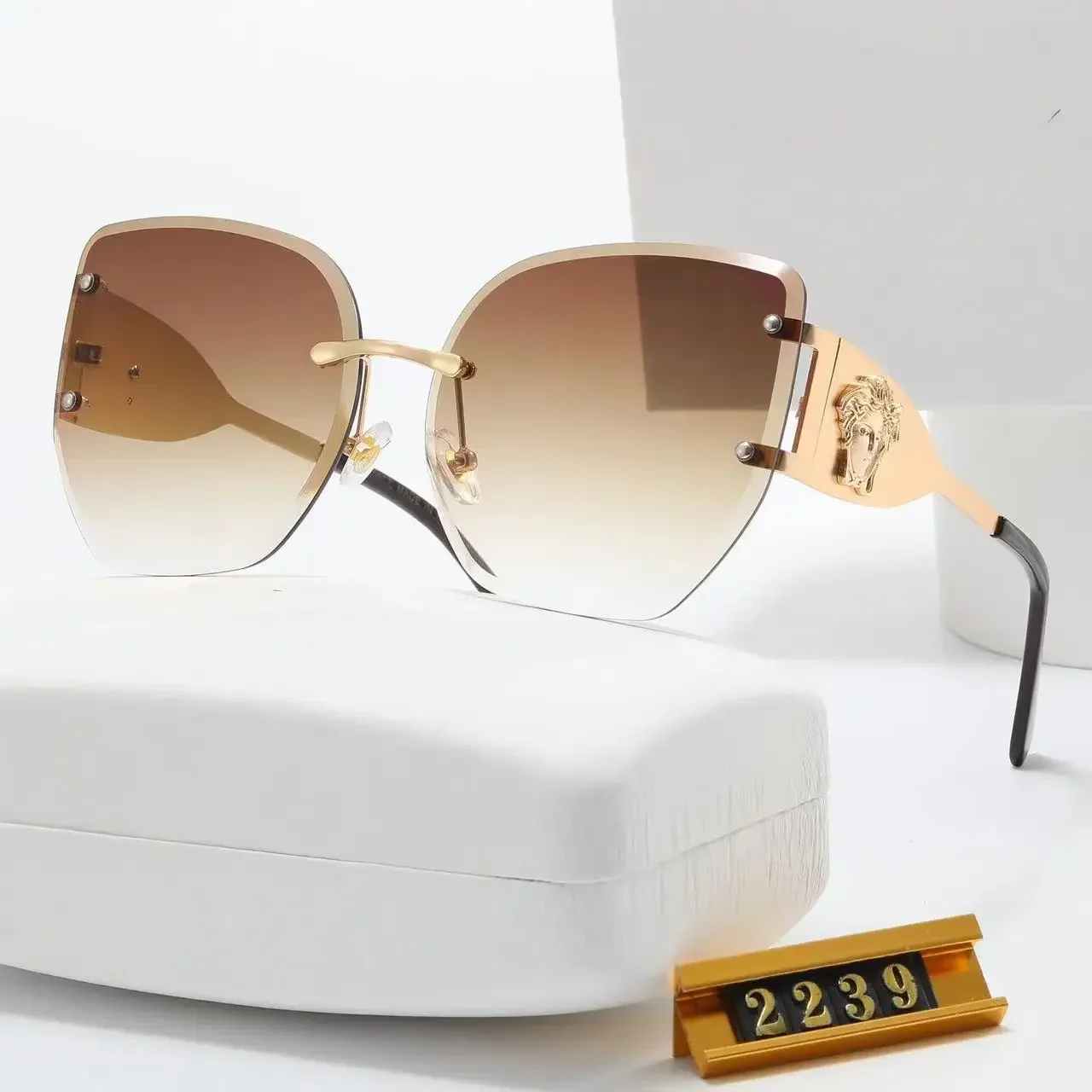 

Новинка 2024, роскошные брендовые новые модные солнцезащитные очки в европейском и американском стиле для мужчин и женщин, солнцезащитные очки без оправы, очки в стиле ретро