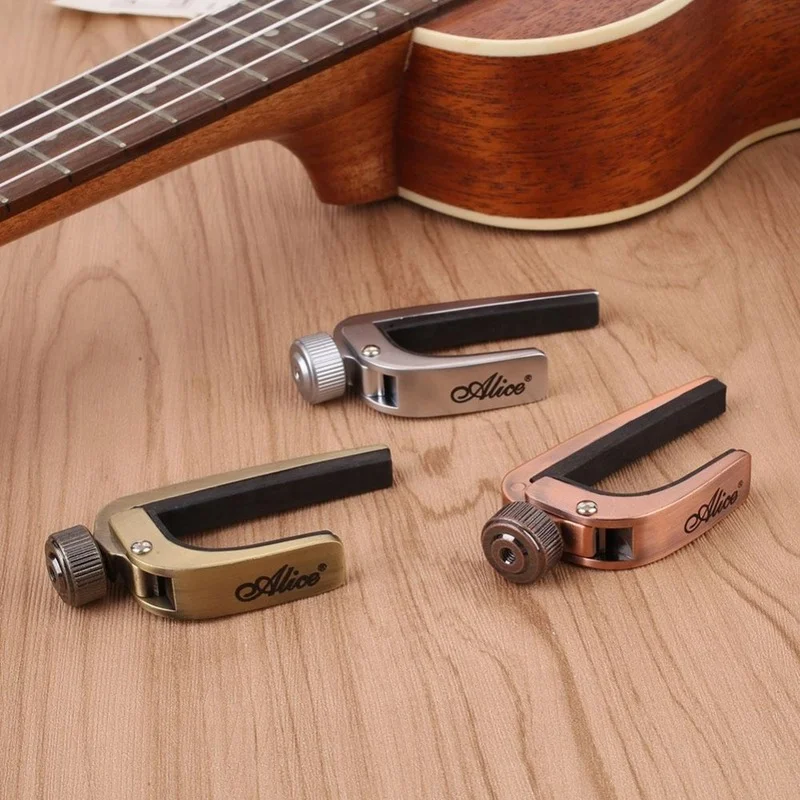 

Guitar Capos Electric Acoustic Guitar Capo Bass Violin Ukulele Capotraste Single-handed Tune Clamp Trigger 3 Colors Metal Capo