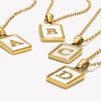 E.B.belle Minimalist Mother of Pearl Shell Stainless Steel Tarnish Free Initial Necklace Gold Plated Letter Necklace for Women