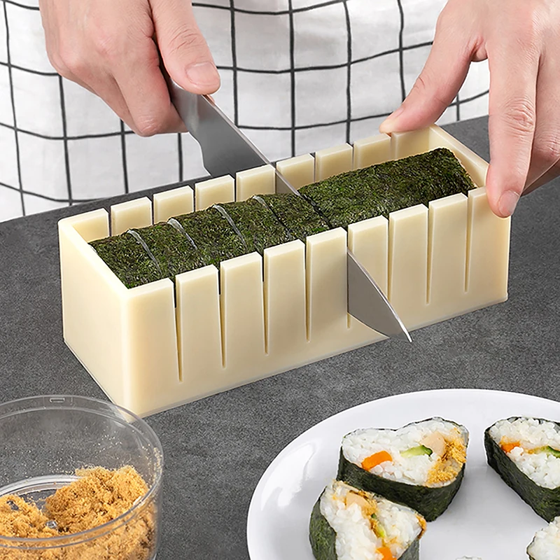 https://ae01.alicdn.com/kf/Saa53e3bec75846f9b740af8cde935bc60/Diy-Sushi-Maker-And-Rice-Circular-Mold-Seaweed-Cake-Plastic-Mold-Multifunctionele-Mould-Square-Sushi-Grinder.jpg